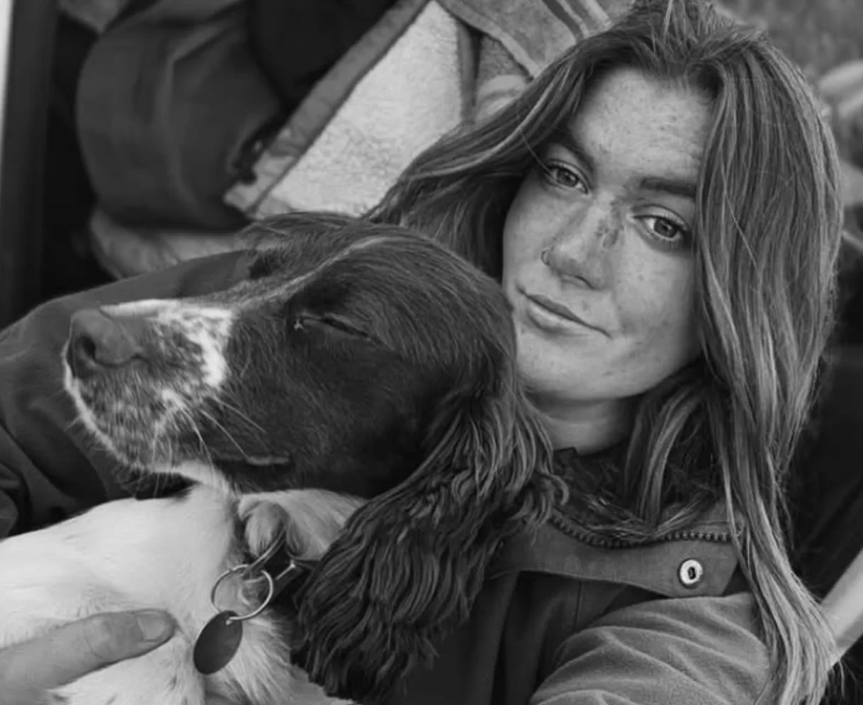 Izzy, founder and head trainer of Dynamic Protection Dogs, with one of her dogs